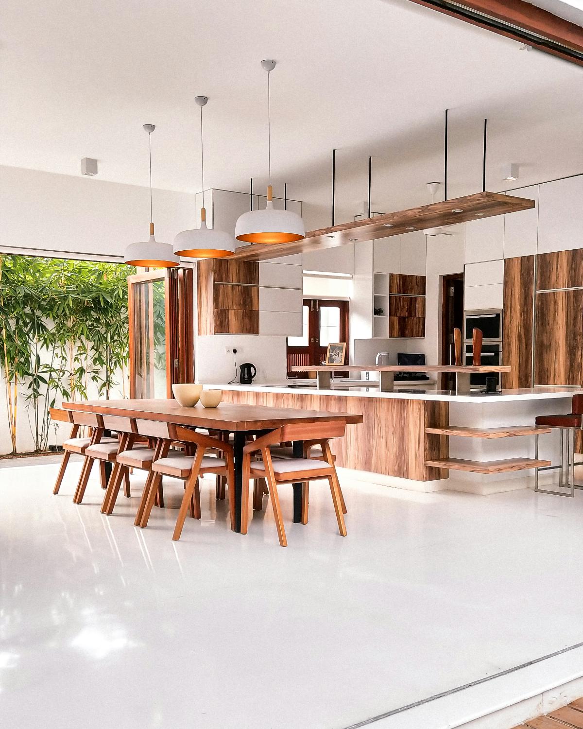 Open-plan kitchen with wooden furnishings.