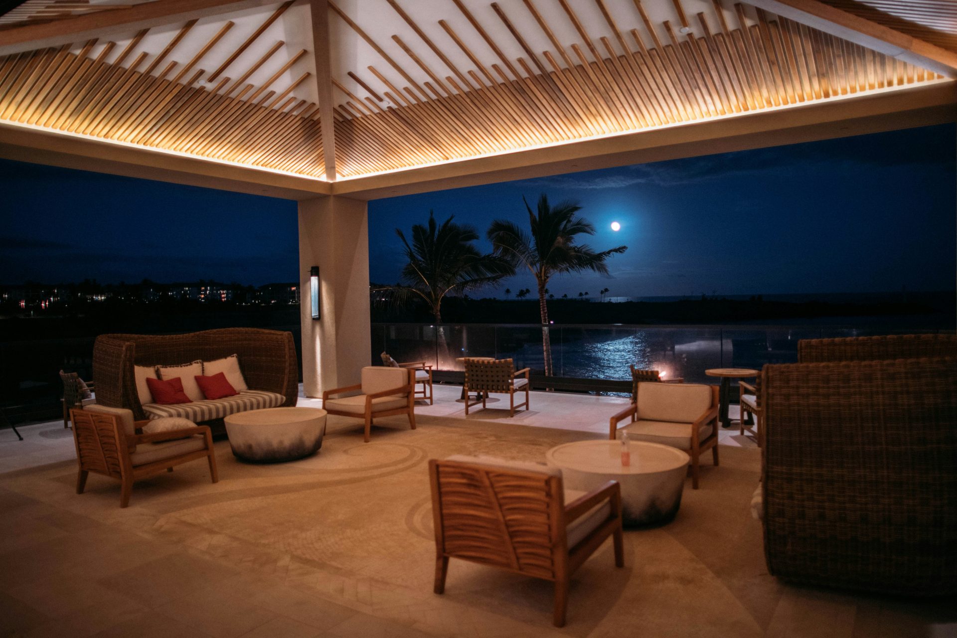 Outdoor lounge area with moonlit view