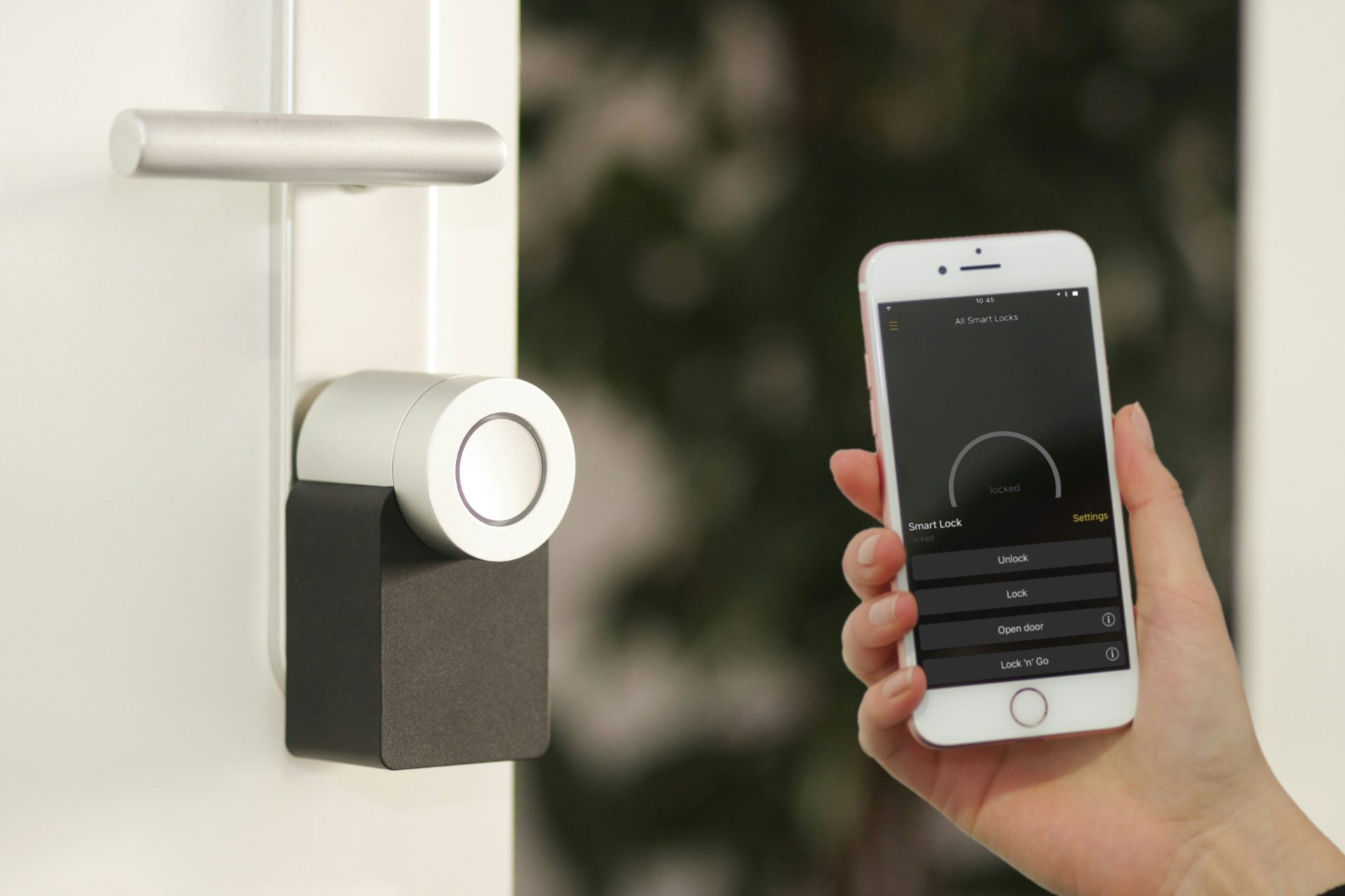 Smartphone controlling a smart lock on a door