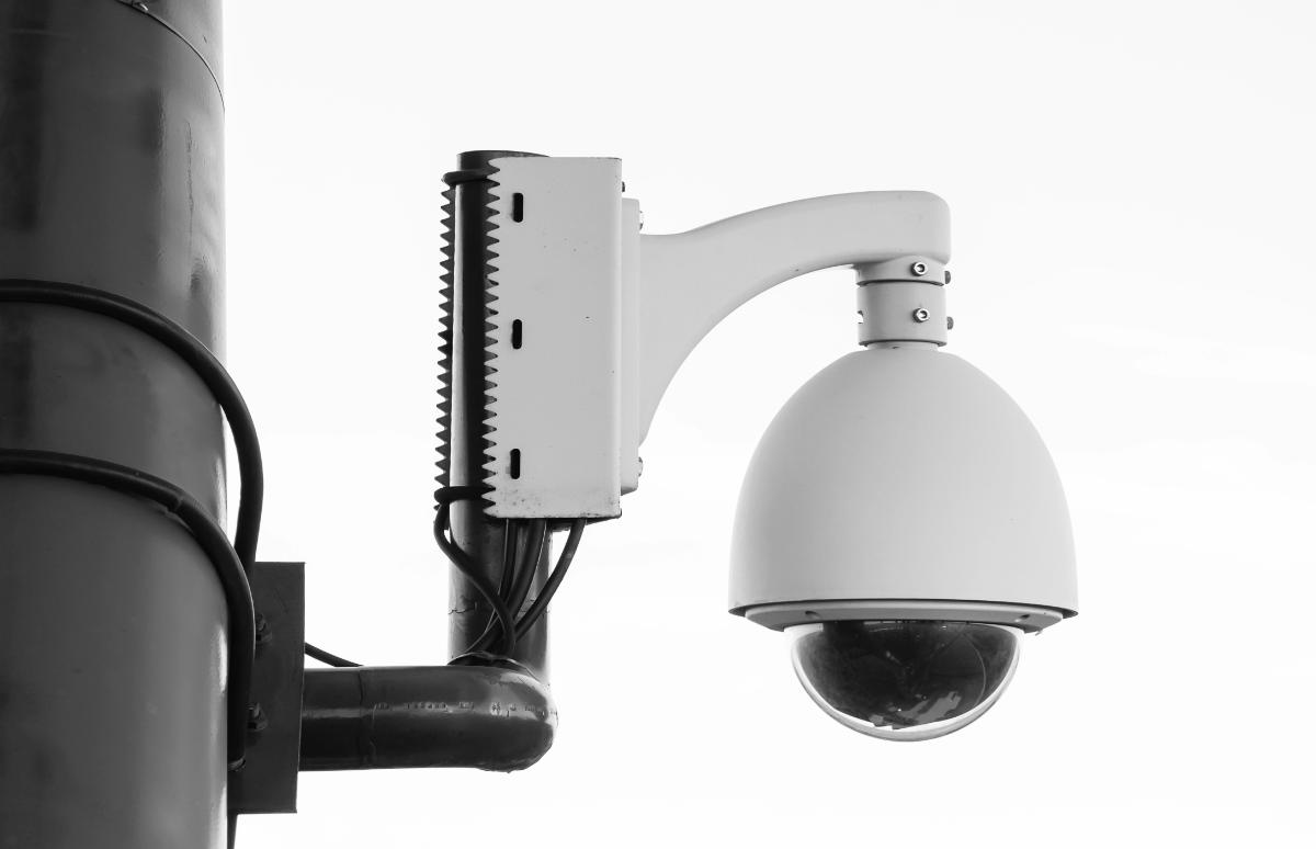 Dome security camera mounted on a wall