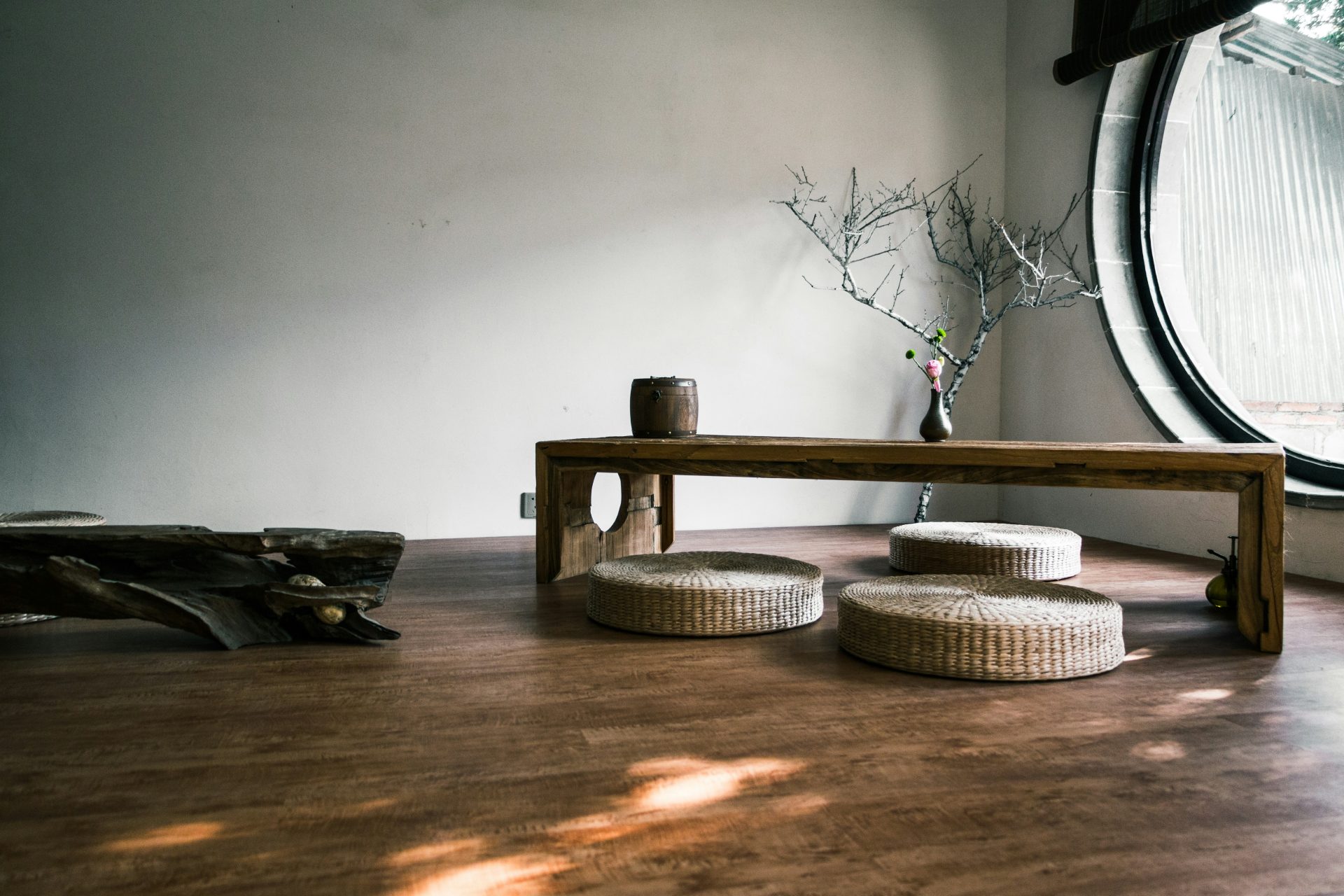 Minimalist room with low table and cushions